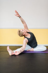 Gretchen Schock doing a yoga stretch called janu sirsasana