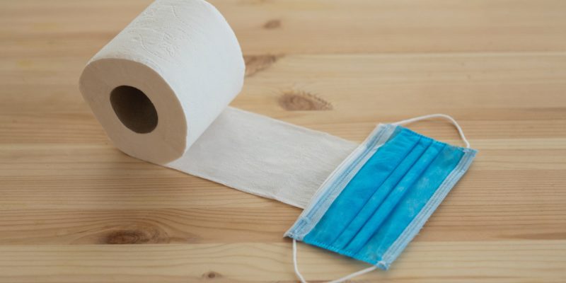 toilet paper roll with a disposable mask