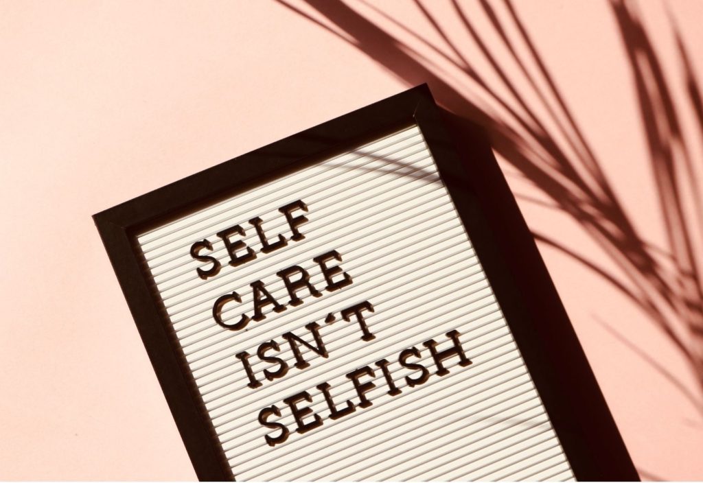 Self care isn't selfish on a small display board